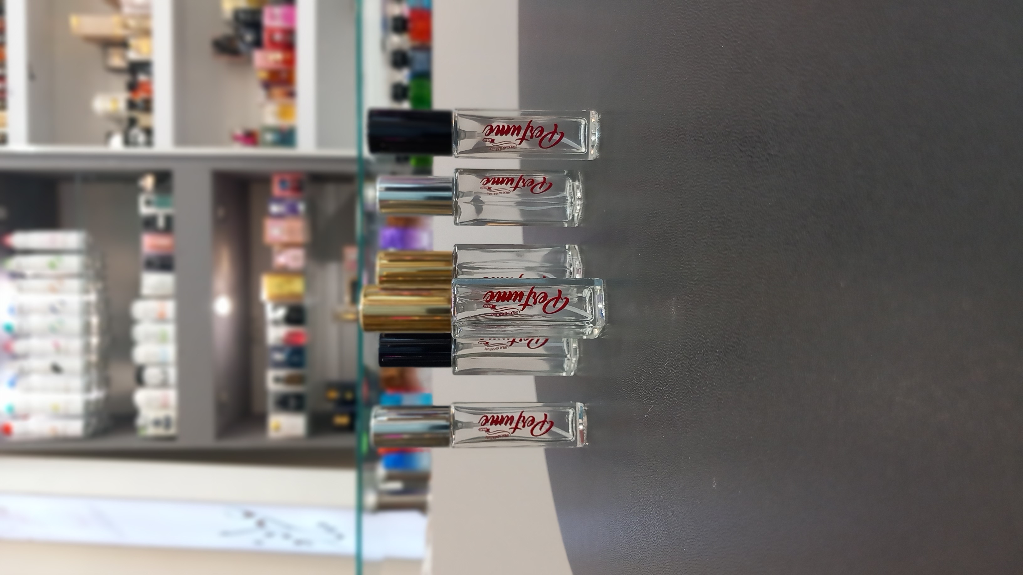شیشه عطر اسپری 8 گرمی لوگو با درب فلزی